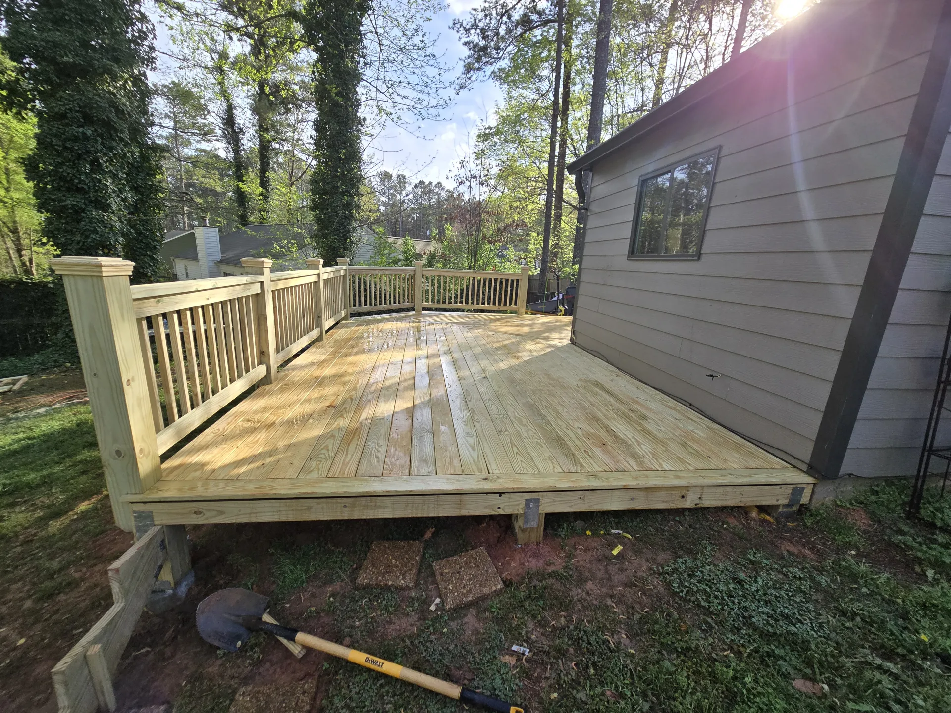 Completed deck freshly washed with sun flare