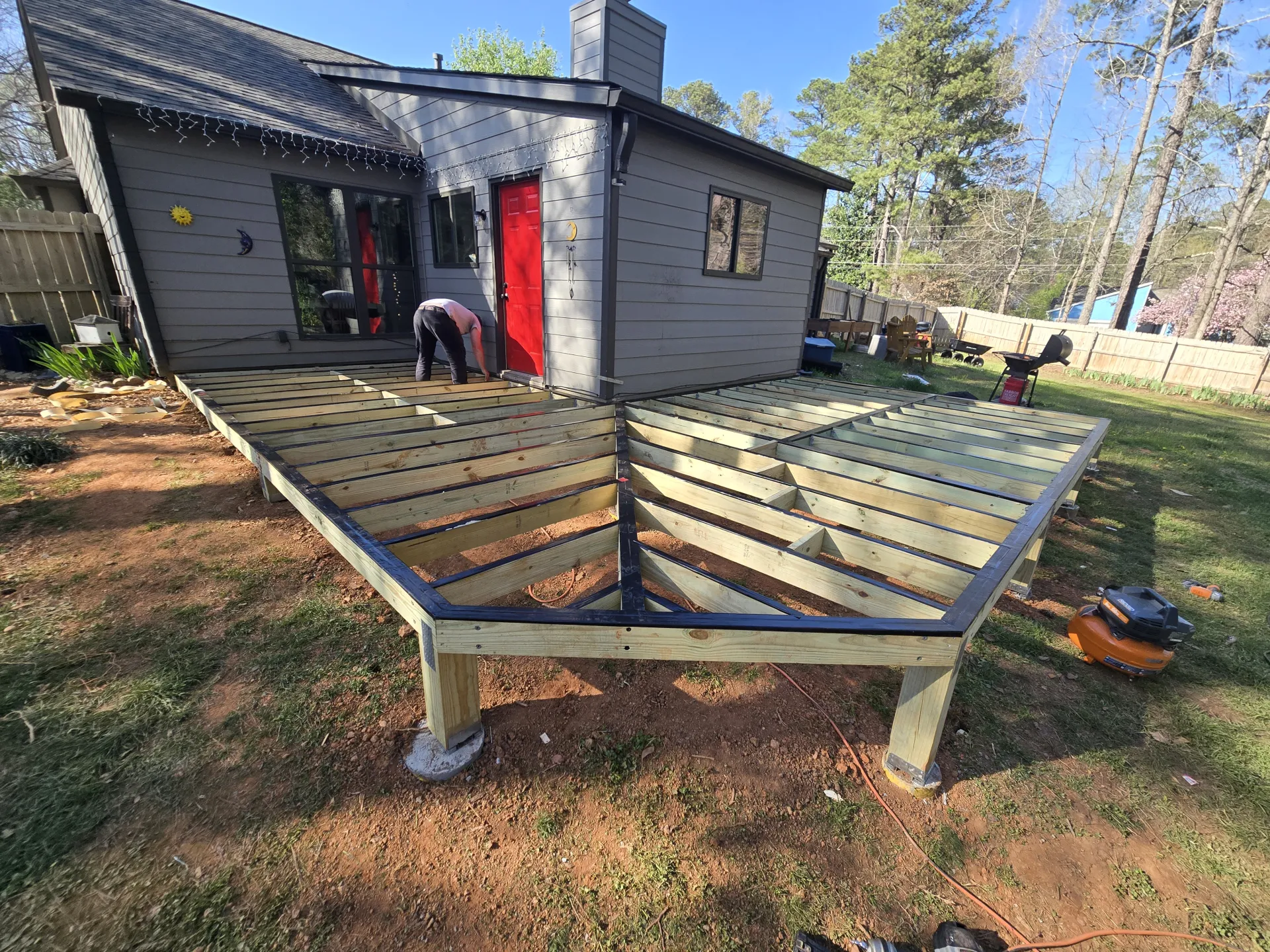 L-shaped deck design under construction