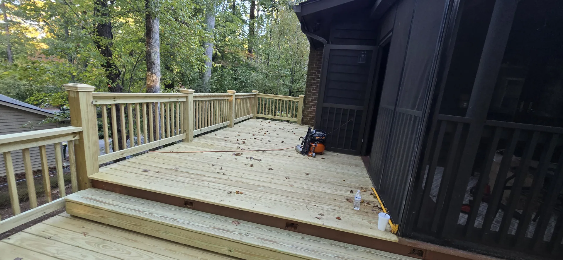Pressure treated deck with multi-level box steps