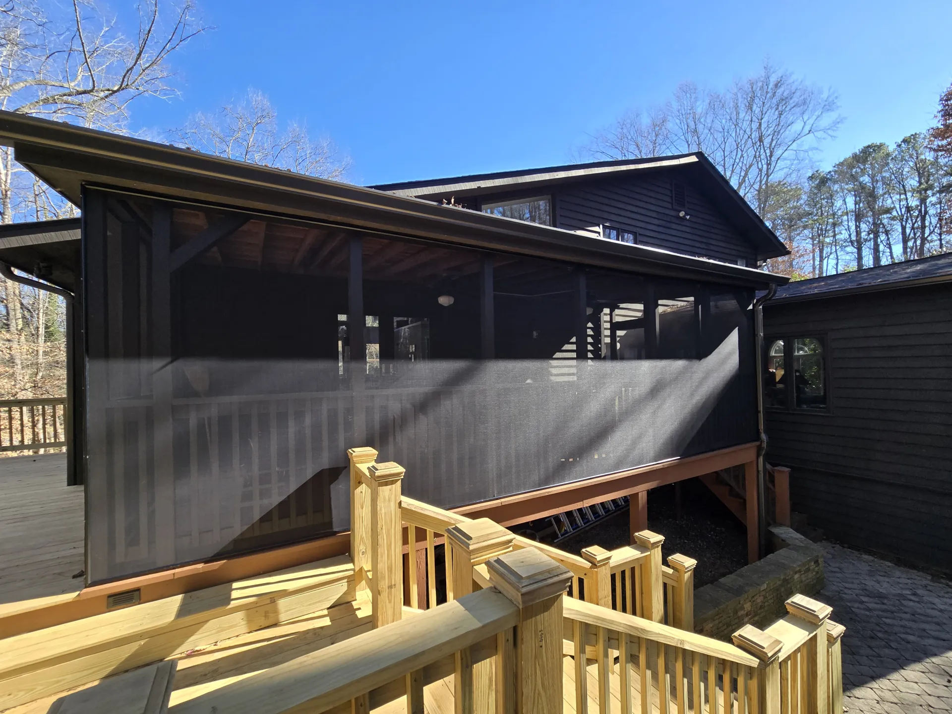 Screened porch with railing detail