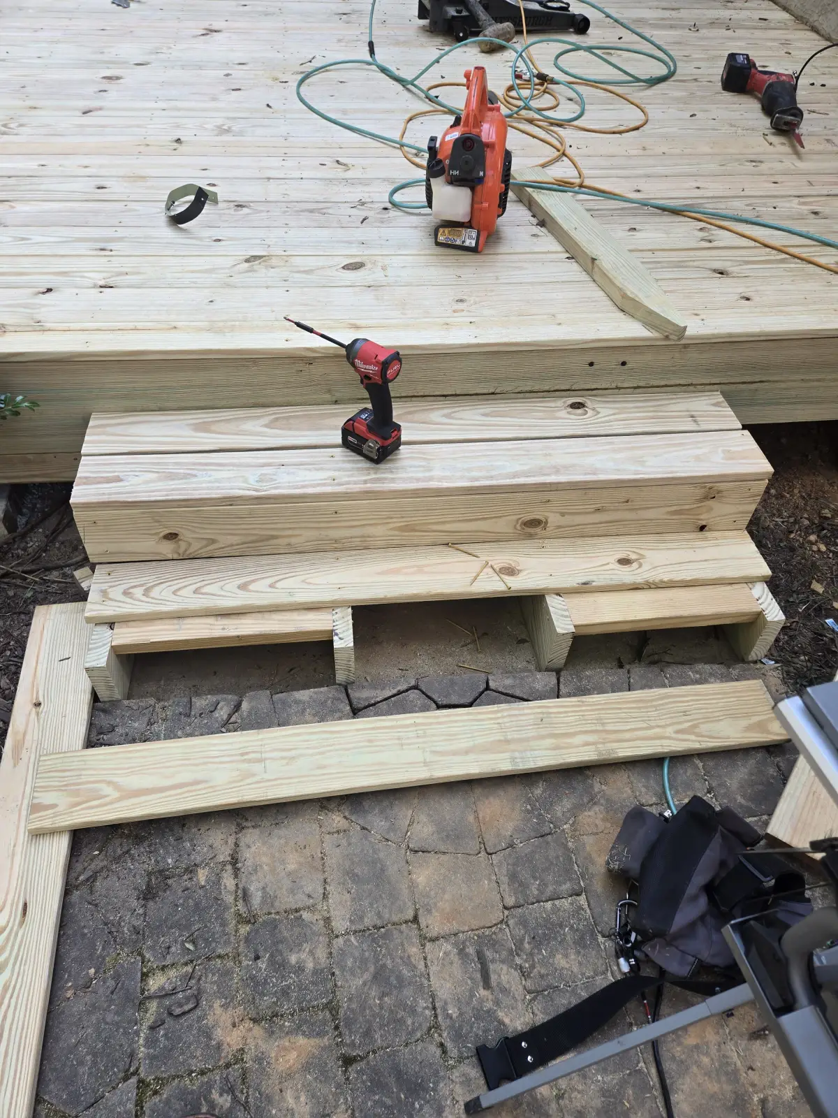Stair box landing being built during deck remodeling